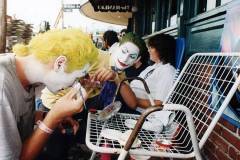 LOS ANGELES, CA - JUNE 19 :  Batman movie fans do their makeup before the Batman movie premiere on June 19, 1989 in Westwood section of Los Angeles, California.  (Photo by Bob Riha, Jr./Getty Images)