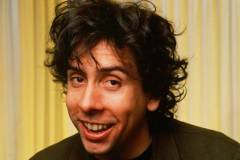 WEST HOLLYWOOD, CA - 1989:  Director of the first "Batman" movie and "Batman Returns," Tim Burton, poses during a 1989 West Hollywood, California, photo portrait session. In addition to his "Batman" fame, Burton went on to direct such eclectic hits as "Ed Wood," "Beetle Juice," "Edward Scissorhands," and the "Corpse Bride." (Photo by George Rose/Getty Images)