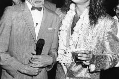 Comic actor Pee-Wee Herman (left) and singer David Lee Roth joking around together at the premiere of the movie 'Pee-Wee's Big Adventure', at Gruman's Chinese Theater in Los Angeles, August 1st 1985. (Photo by Kevin Winter/Getty Images)